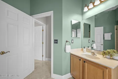 a view of a house with backyard porch and sitting area