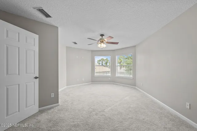 a view of a house with a big yard