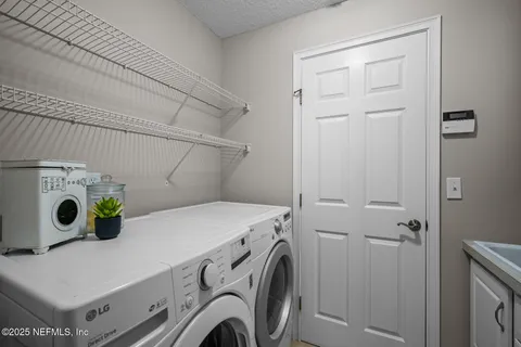 an aerial view of a house with a garden