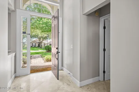 a view of a livingroom with furniture and window