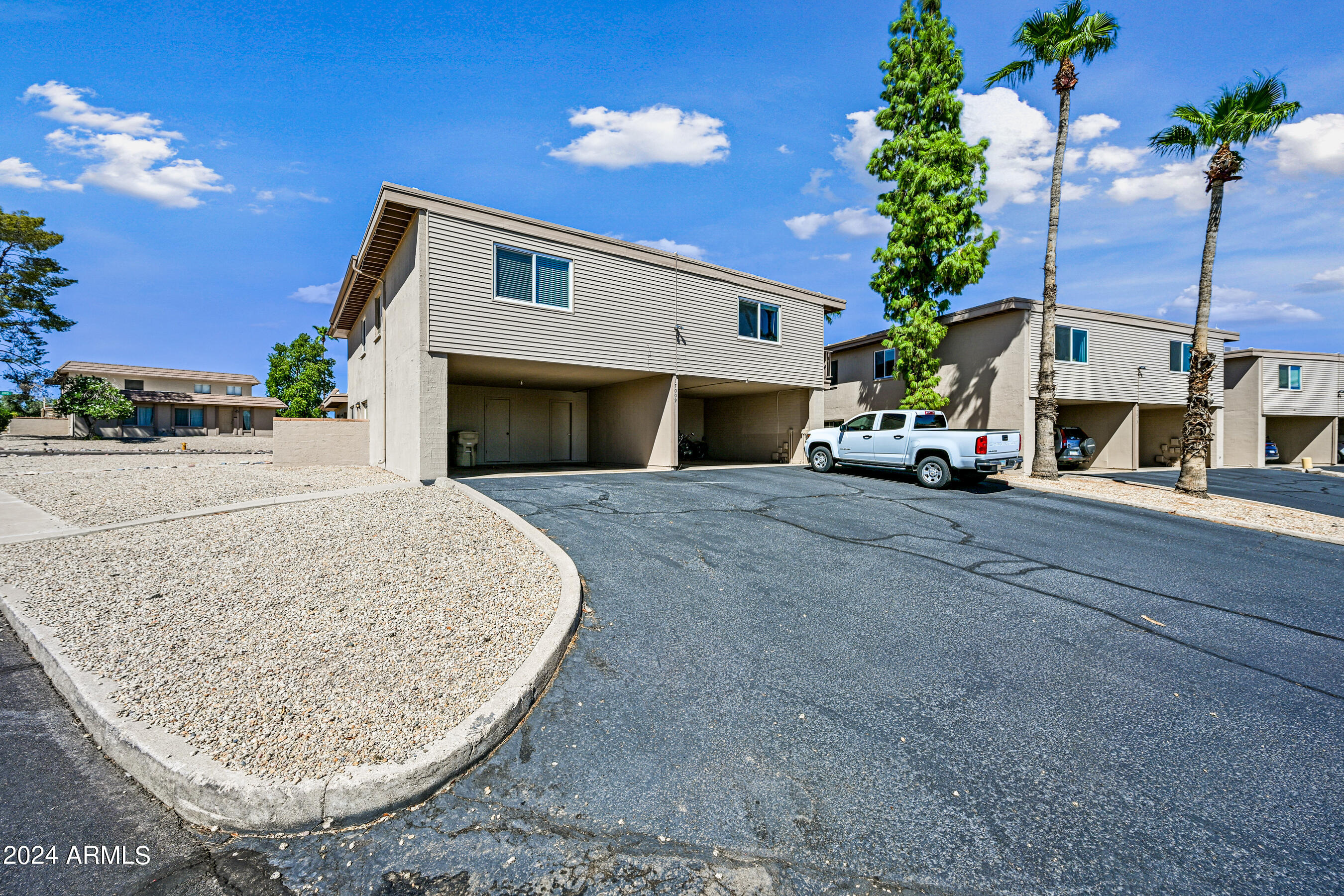 17009 East Calle Del Oro, Unit D Fountain Hills, AZ 85268 - Photo 17 of 18 a view of a house with a patio
