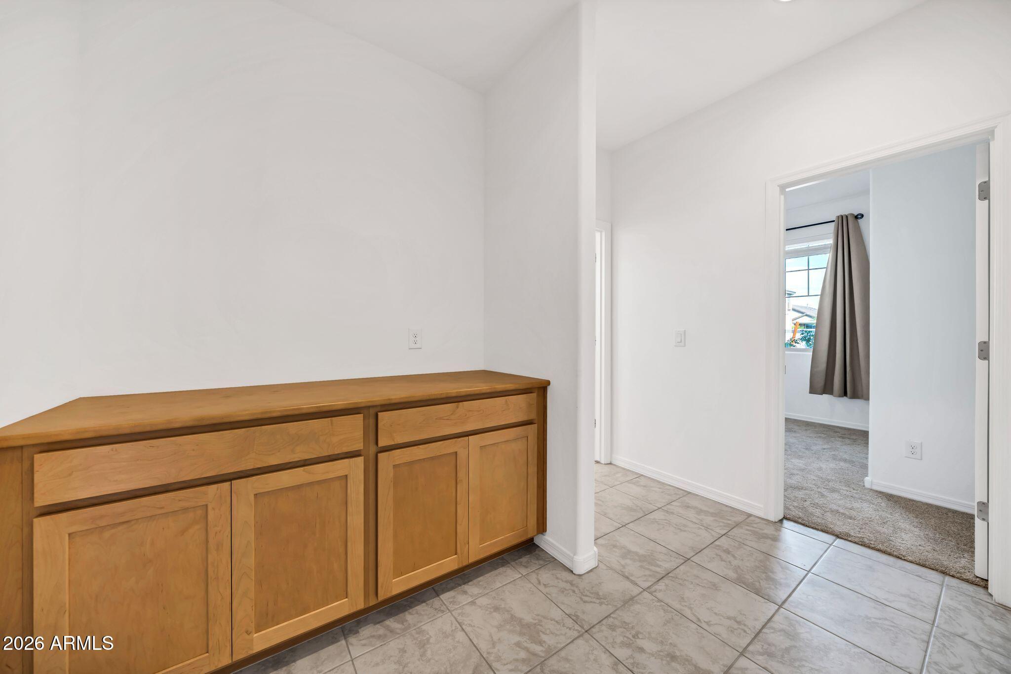 10223 West Piccadilly Road Avondale, AZ 85392 - Photo 19 of 35 a view of a closet area with entryway