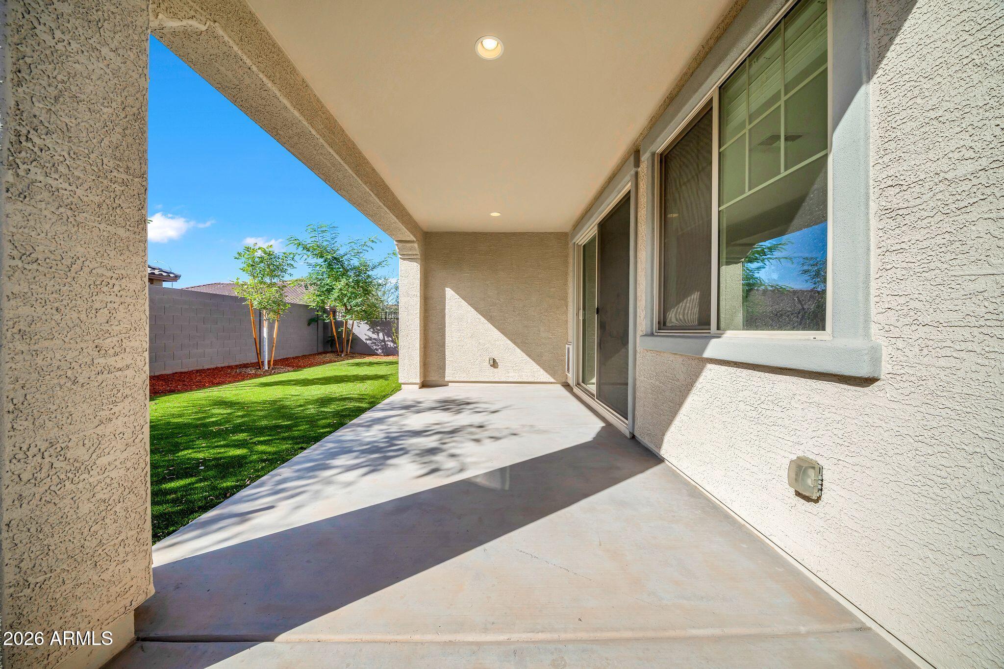 10223 West Piccadilly Road Avondale, AZ 85392 - Photo 24 of 35 a view of a house with a backyard