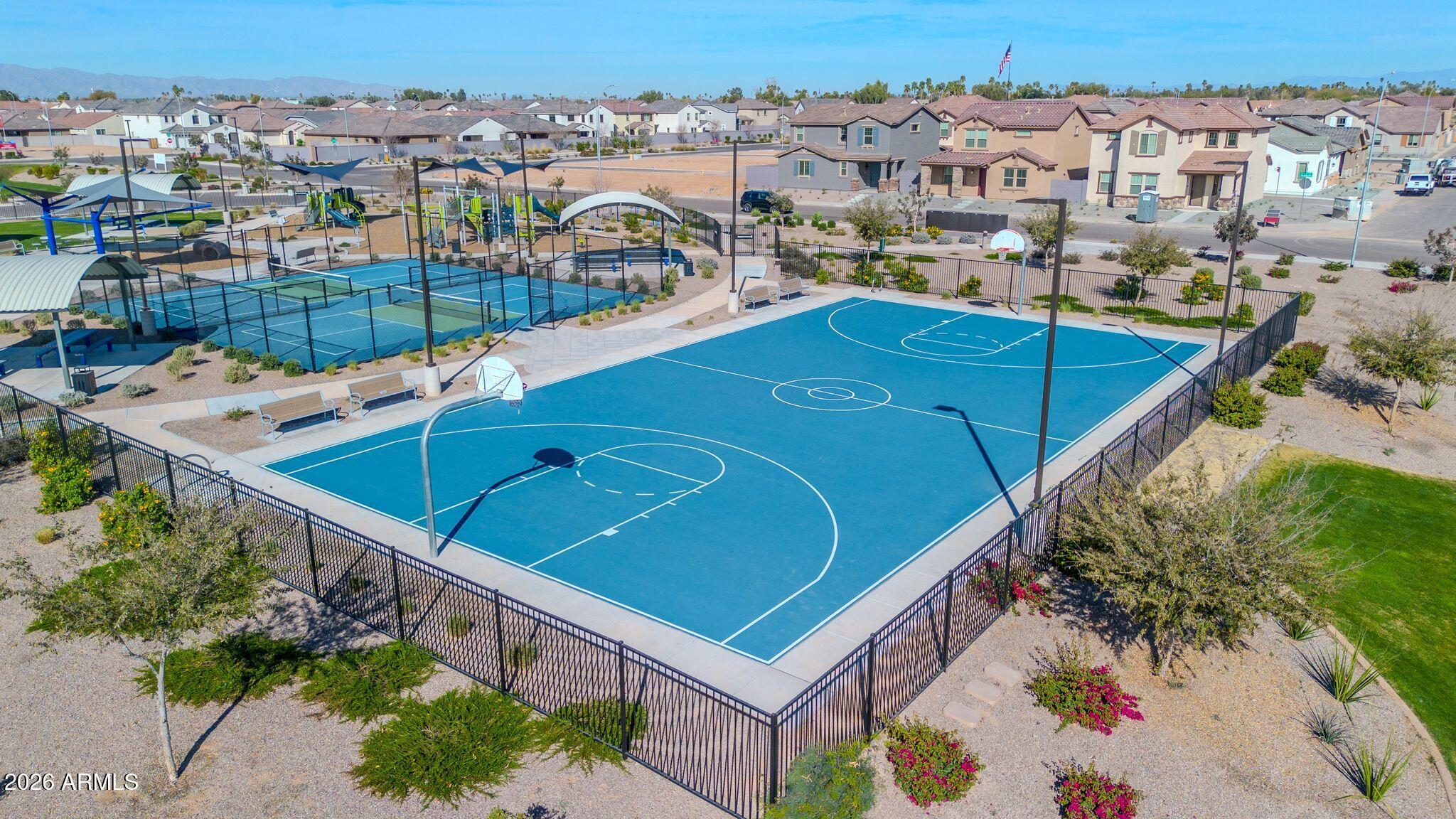 10223 West Piccadilly Road Avondale, AZ 85392 - Photo 29 of 35 an aerial view of residential houses with outdoor space and trees