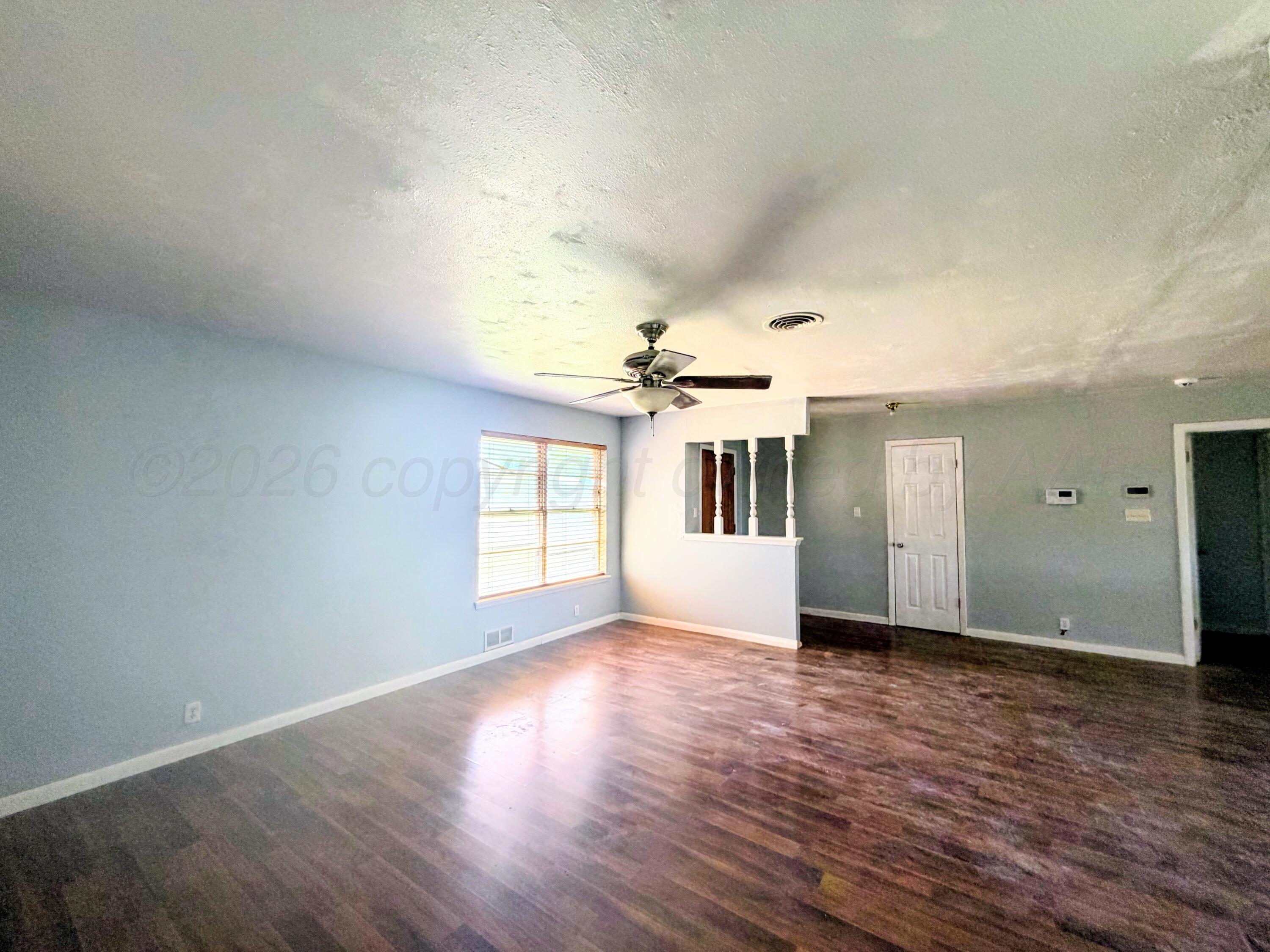 1010 Northwestern Street Perryton, TX 79070 - Photo 7 of 32 1010 NORTHWESTERN LIVING ROOM