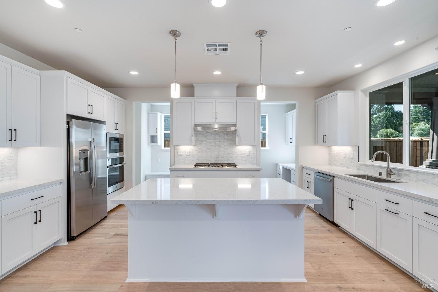 3461 Ruston Lane Napa, CA 94558 - Photo 1 of 22 a large kitchen with stainless steel appliances kitchen island granite countertop a large counter top a sink stainless steel appliances and cabinets