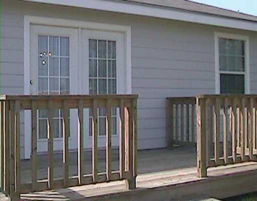 218 Oak Ridge Drive Corpus Christi, TX 78418 - Photo 3 of 8 a view of a building from a window