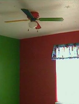 a close up of a wall with a kitchen