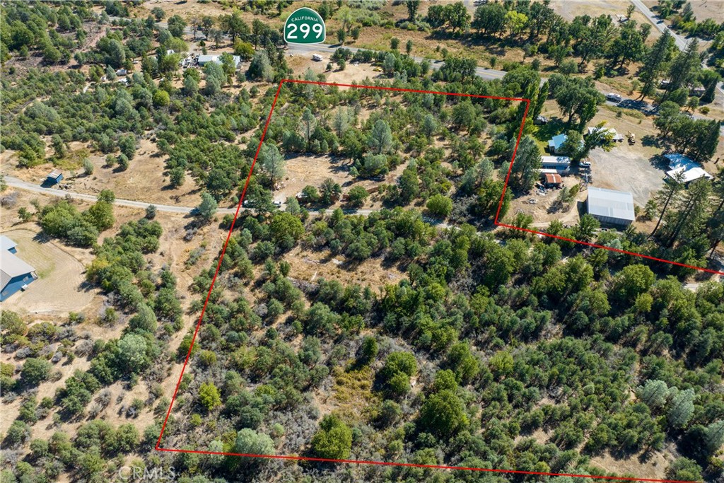 0 Round Mountain Road Montgomery Creek, CA 96065 - Photo 5 of 8 an aerial view of residential houses with outdoor space and trees