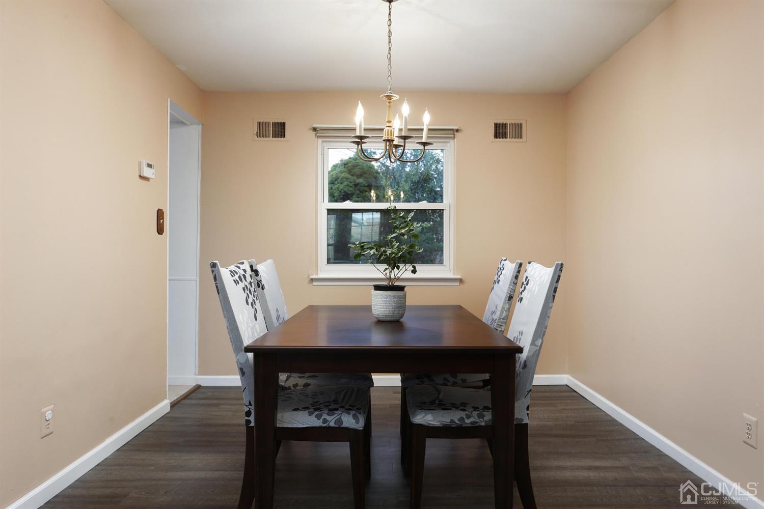 40 Azalea Drive Edison, NJ 08820 - Photo 12 of 36 a view of a dining room with furniture window and outside view