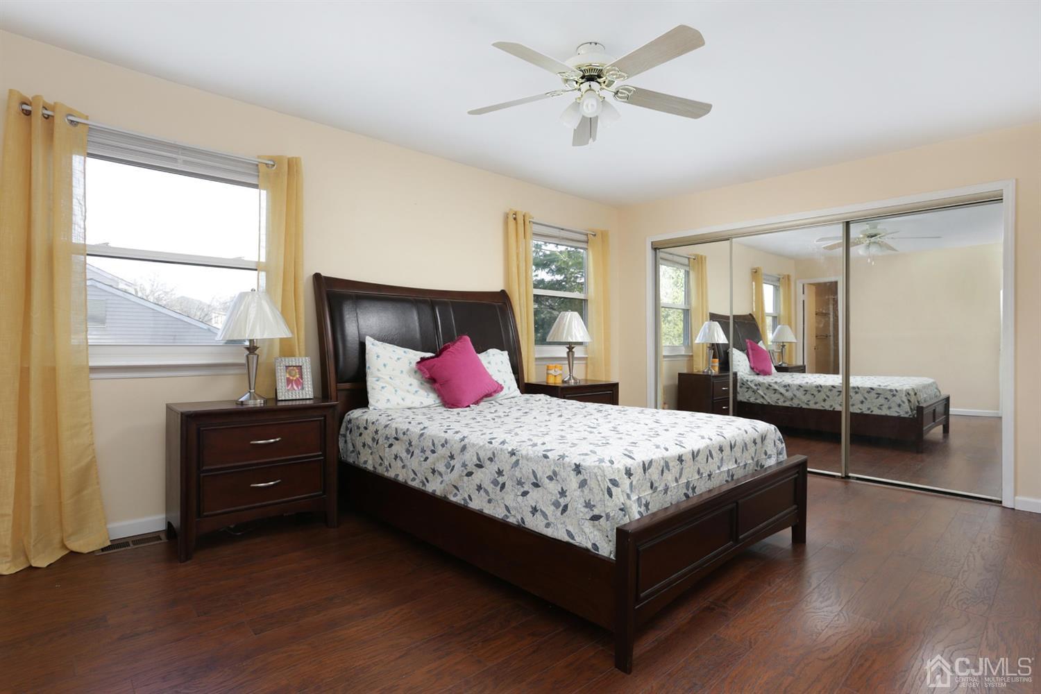 40 Azalea Drive Edison, NJ 08820 - Photo 23 of 36 a bedroom with a bed and a large window