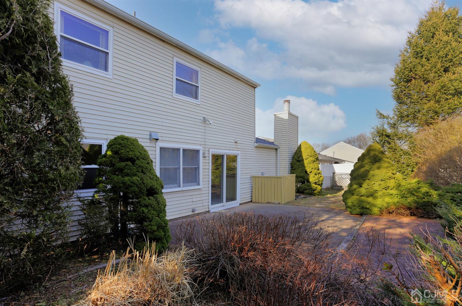40 Azalea Drive Edison, NJ 08820 - Photo 29 of 36 a front view of a house with a yard