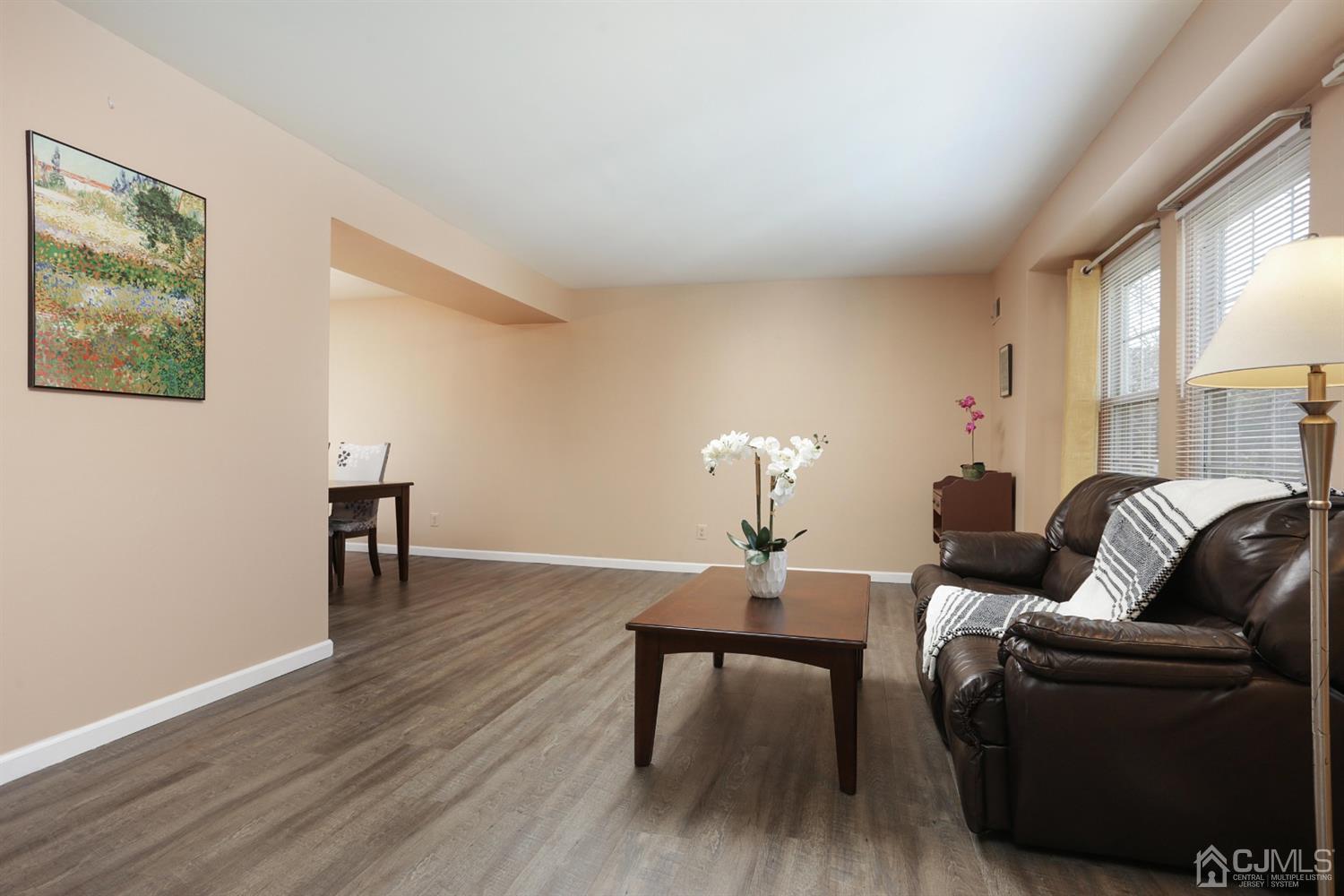 40 Azalea Drive Edison, NJ 08820 - Photo 8 of 36 a living room with furniture and a wooden floor