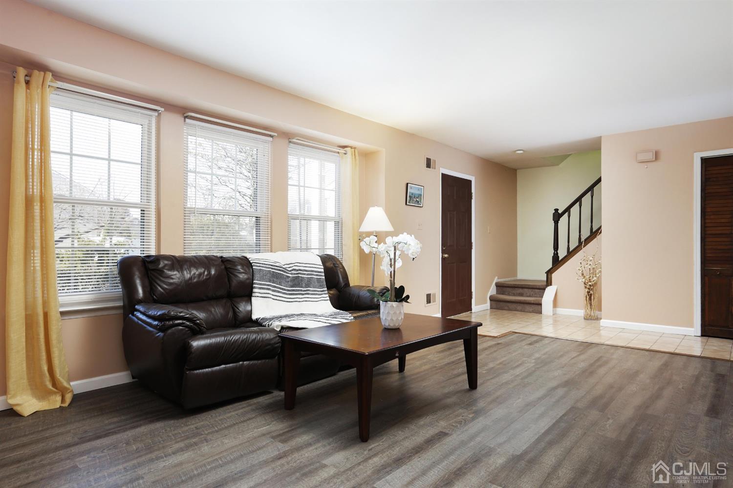 40 Azalea Drive Edison, NJ 08820 - Photo 10 of 36 a living room with furniture and a window