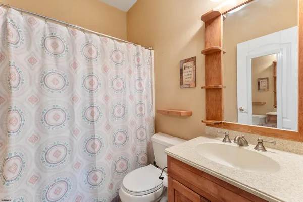 a view of a room with stairs and a wooden floors