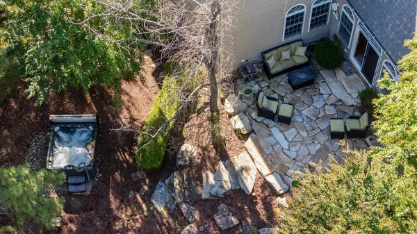 a backyard of a house with lots of green space