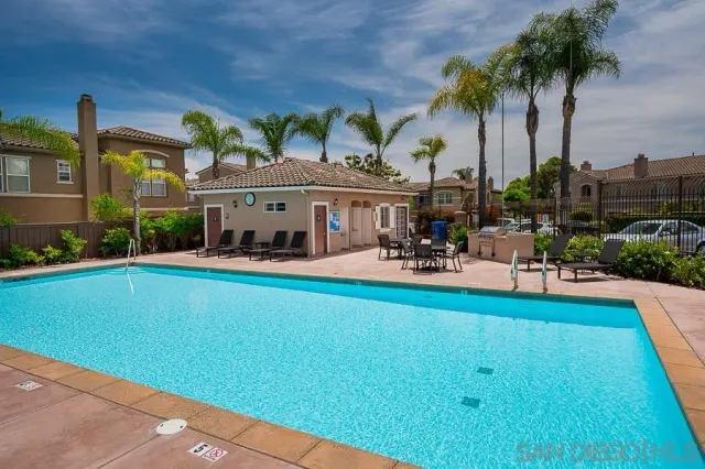 a view of a patio with swimming pool