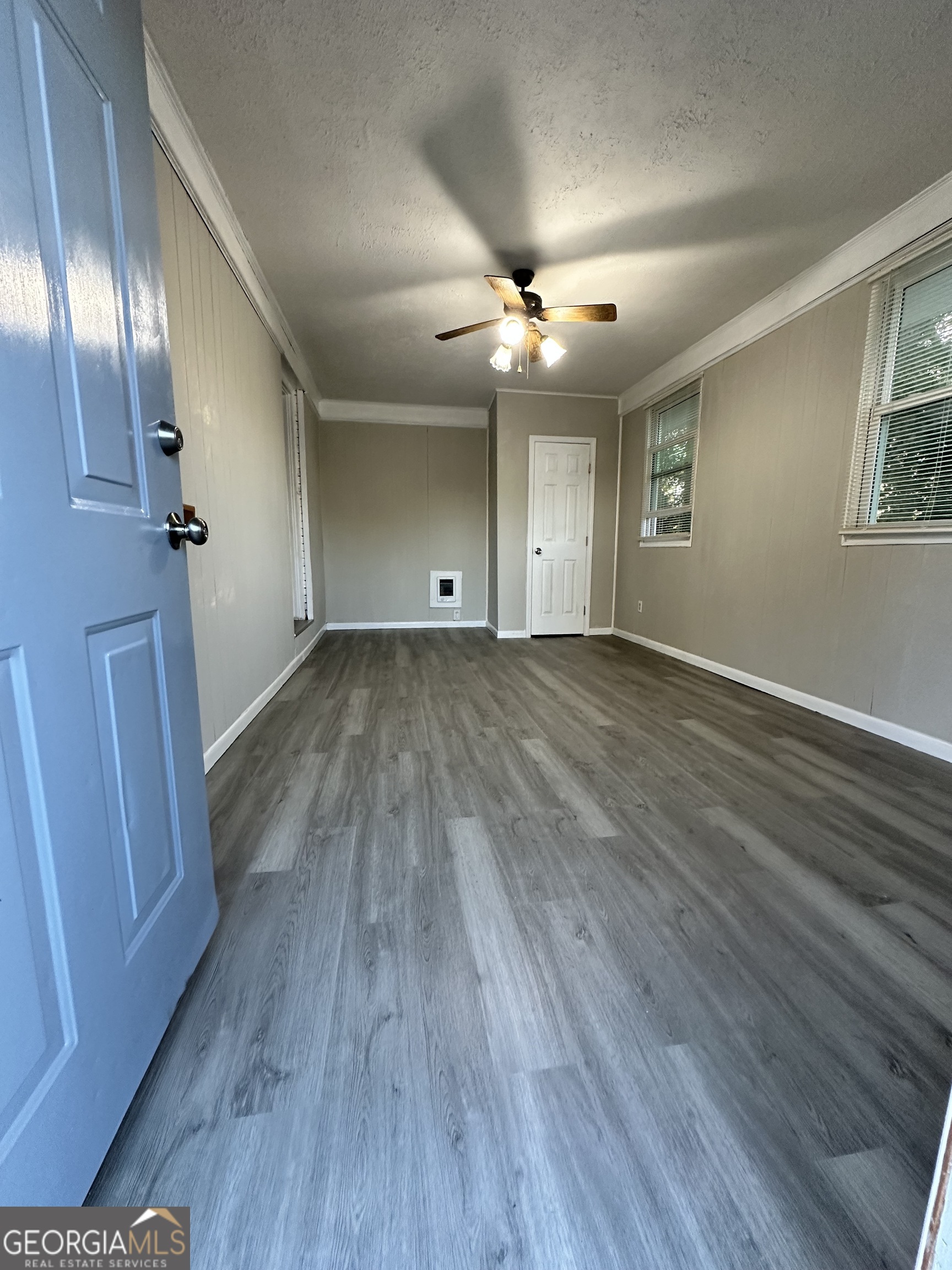 1865 Vicki Lane Southeast Atlanta, GA 30316 - Photo 6 of 15 wooden floor in an empty room with a window