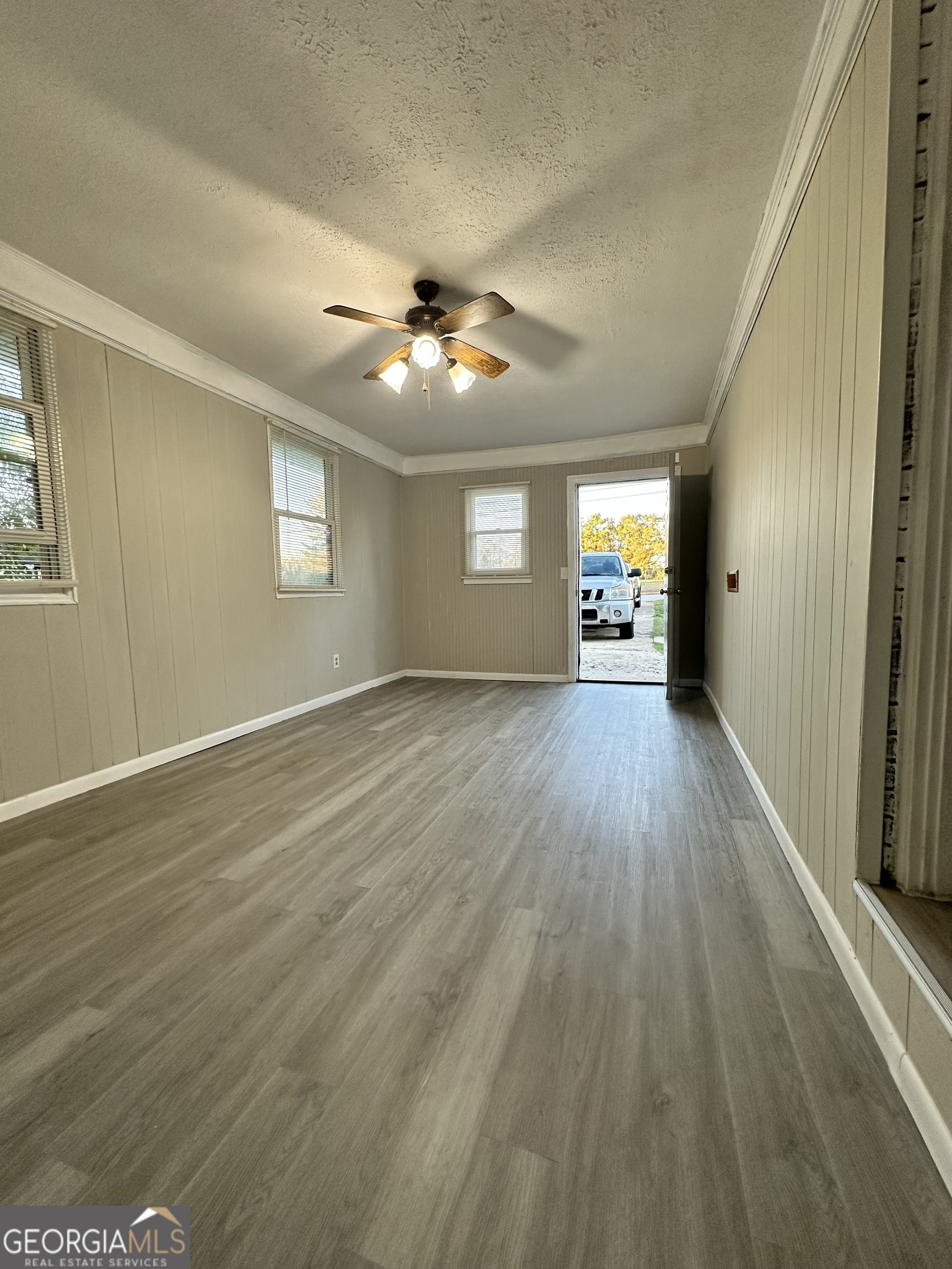 1865 Vicki Lane Southeast Atlanta, GA 30316 - Photo 7 of 15 wooden floor in an empty room with a window
