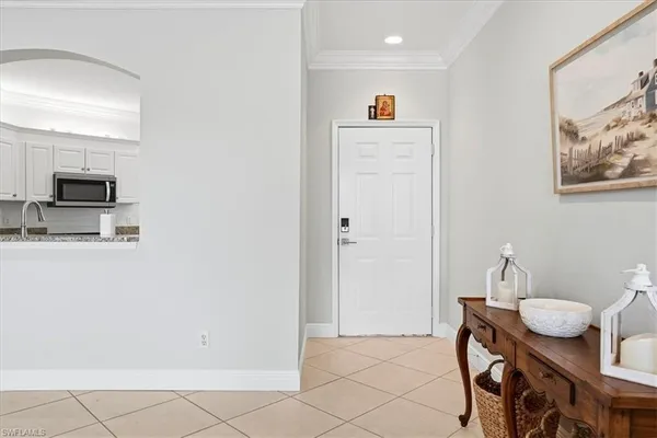a view of a kitchen from the dinning room