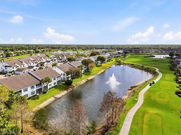 a view of a lake with a city