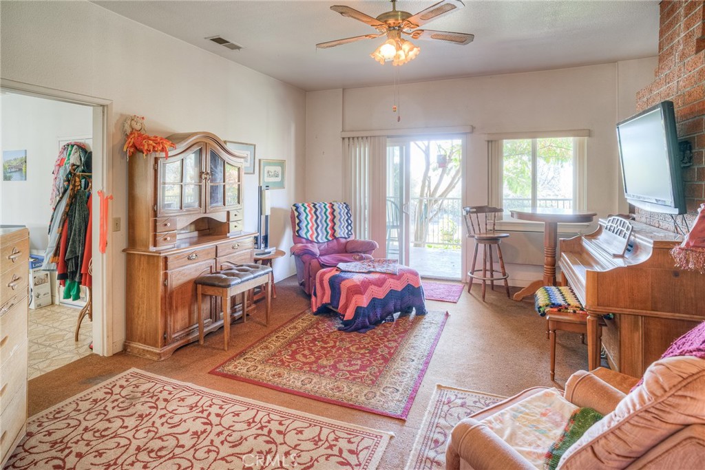 1361 Mt Ida Road Oroville, CA 95966 - Photo 11 of 44 a bedroom with furniture and a large window
