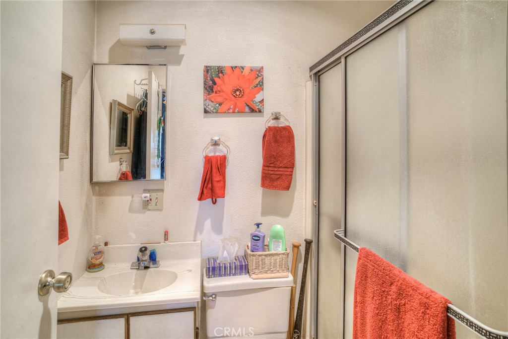 1361 Mt Ida Road Oroville, CA 95966 - Photo 14 of 44 a bathroom with a sink and a mirror
