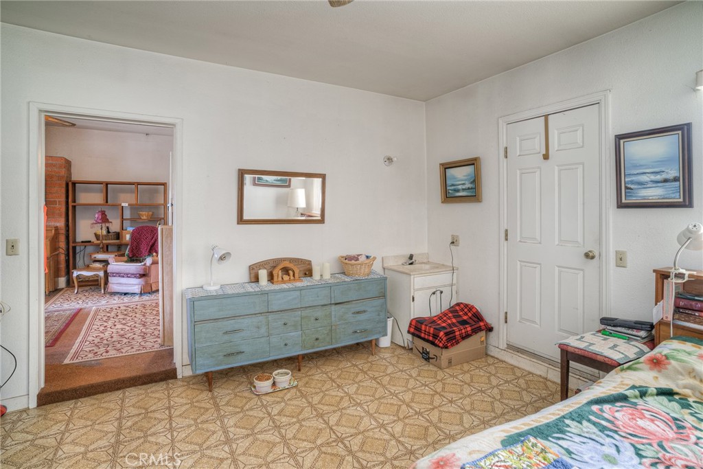 1361 Mt Ida Road Oroville, CA 95966 - Photo 16 of 44 a bedroom with furniture and a rug