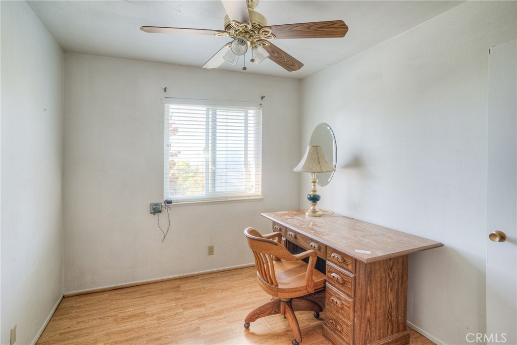 1361 Mt Ida Road Oroville, CA 95966 - Photo 20 of 44 a view of a workspace with furniture and a window