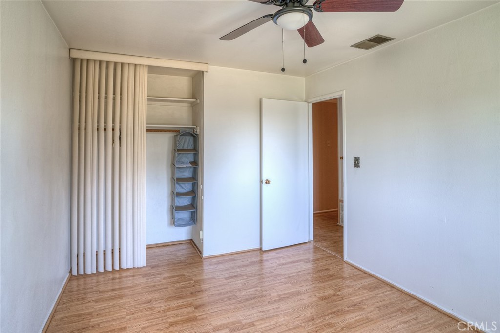 1361 Mt Ida Road Oroville, CA 95966 - Photo 21 of 44 wooden floor in an empty room with a window