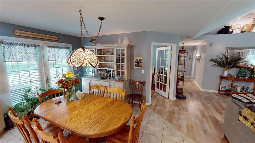 123 Hunt Road Butler, PA 16001 - Photo 13 of 44 a living room filled with furniture and a chandelier