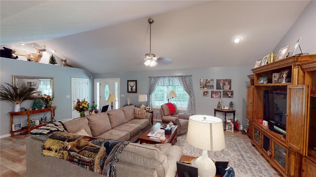 123 Hunt Road Butler, PA 16001 - Photo 14 of 44 a living room with furniture a window and a flat screen tv