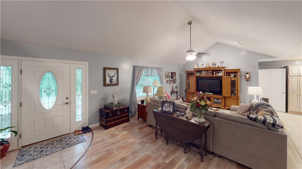 123 Hunt Road Butler, PA 16001 - Photo 15 of 44 a living room with furniture a flat screen tv and a window