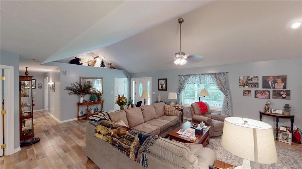 123 Hunt Road Butler, PA 16001 - Photo 16 of 44 a living room with furniture and a wooden floor