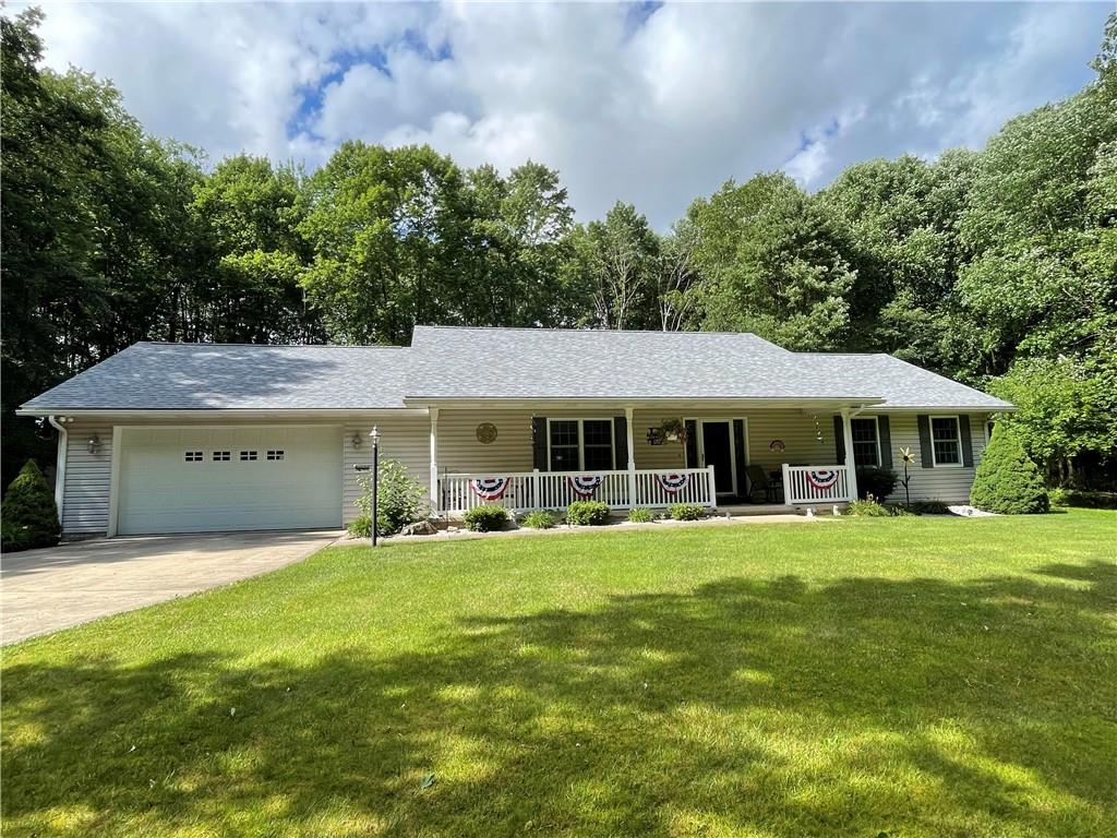 123 Hunt Road Butler, PA 16001 - Photo 2 of 44 a front view of a house with a garden