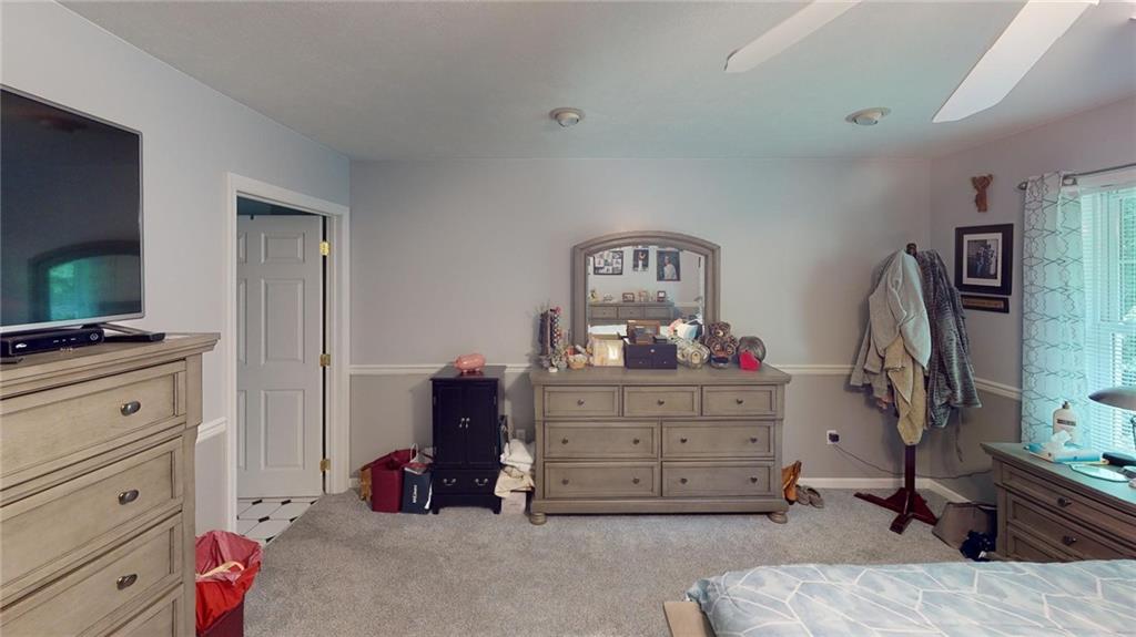 123 Hunt Road Butler, PA 16001 - Photo 21 of 44 a bedroom with a bed and furniture