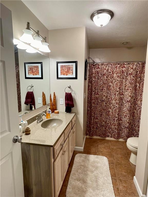 123 Hunt Road Butler, PA 16001 - Photo 25 of 44 a bathroom with a sink toilet and shower