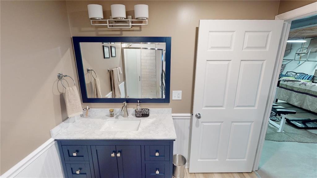123 Hunt Road Butler, PA 16001 - Photo 28 of 44 a bathroom with a sink and a mirror