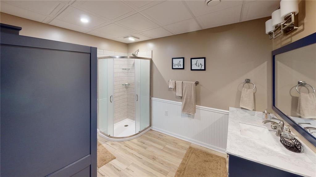 123 Hunt Road Butler, PA 16001 - Photo 29 of 44 a bathroom with double vanity sink and mirror