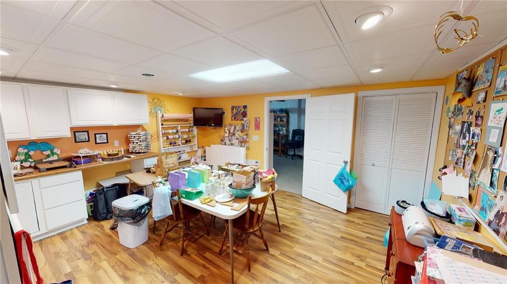 123 Hunt Road Butler, PA 16001 - Photo 30 of 44 a living room with furniture and wooden floor