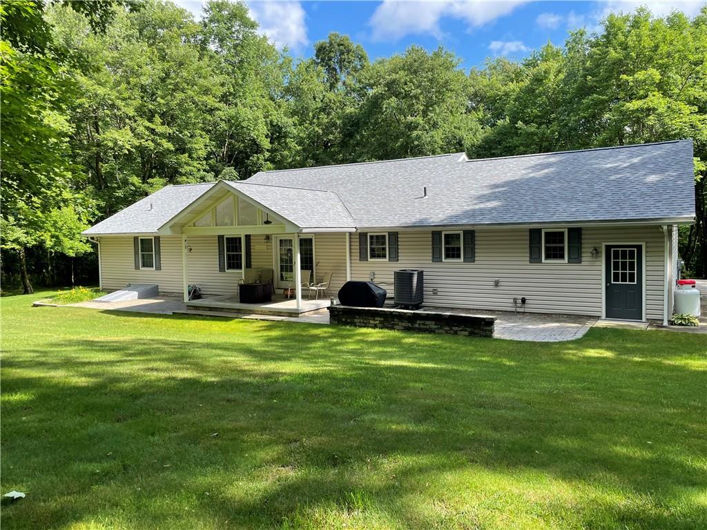 123 Hunt Road Butler, PA 16001 - Photo 35 of 44 a front view of a house with a garden