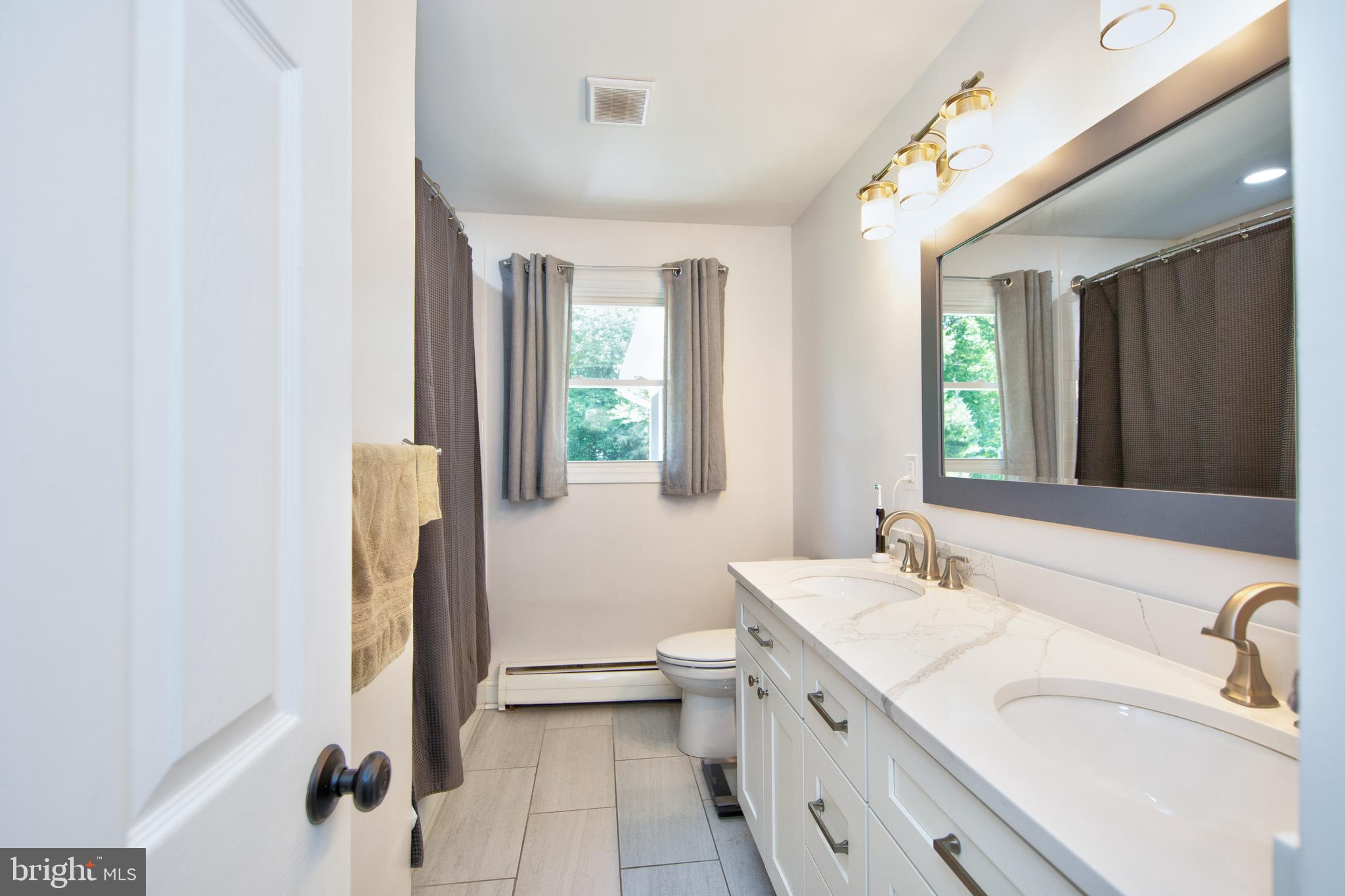 214 W Road Essex, MD 21221 - Photo 14 of 33 Newly renovated bathroom