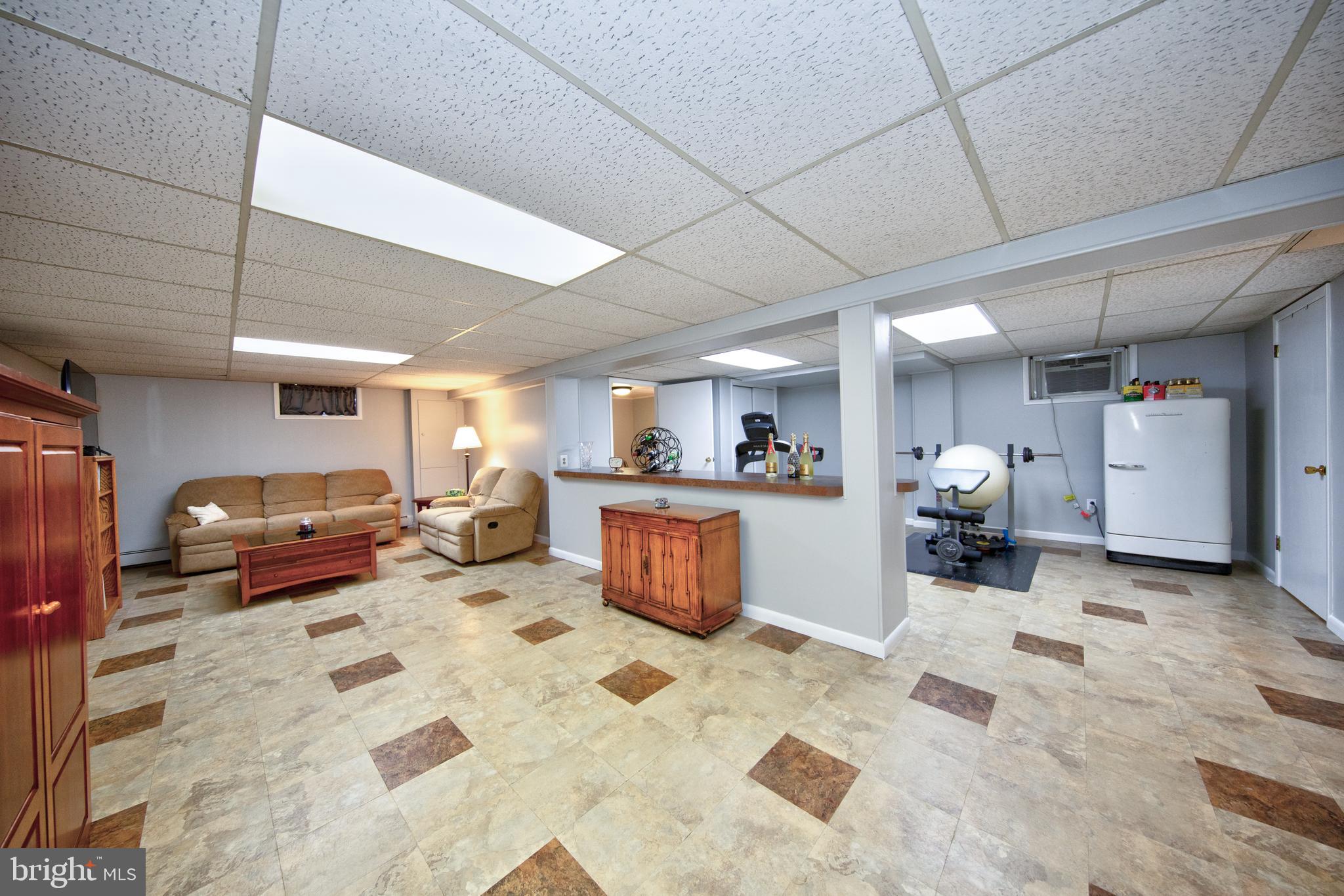 214 W Road Essex, MD 21221 - Photo 19 of 33 Huge finished basement w/Family room