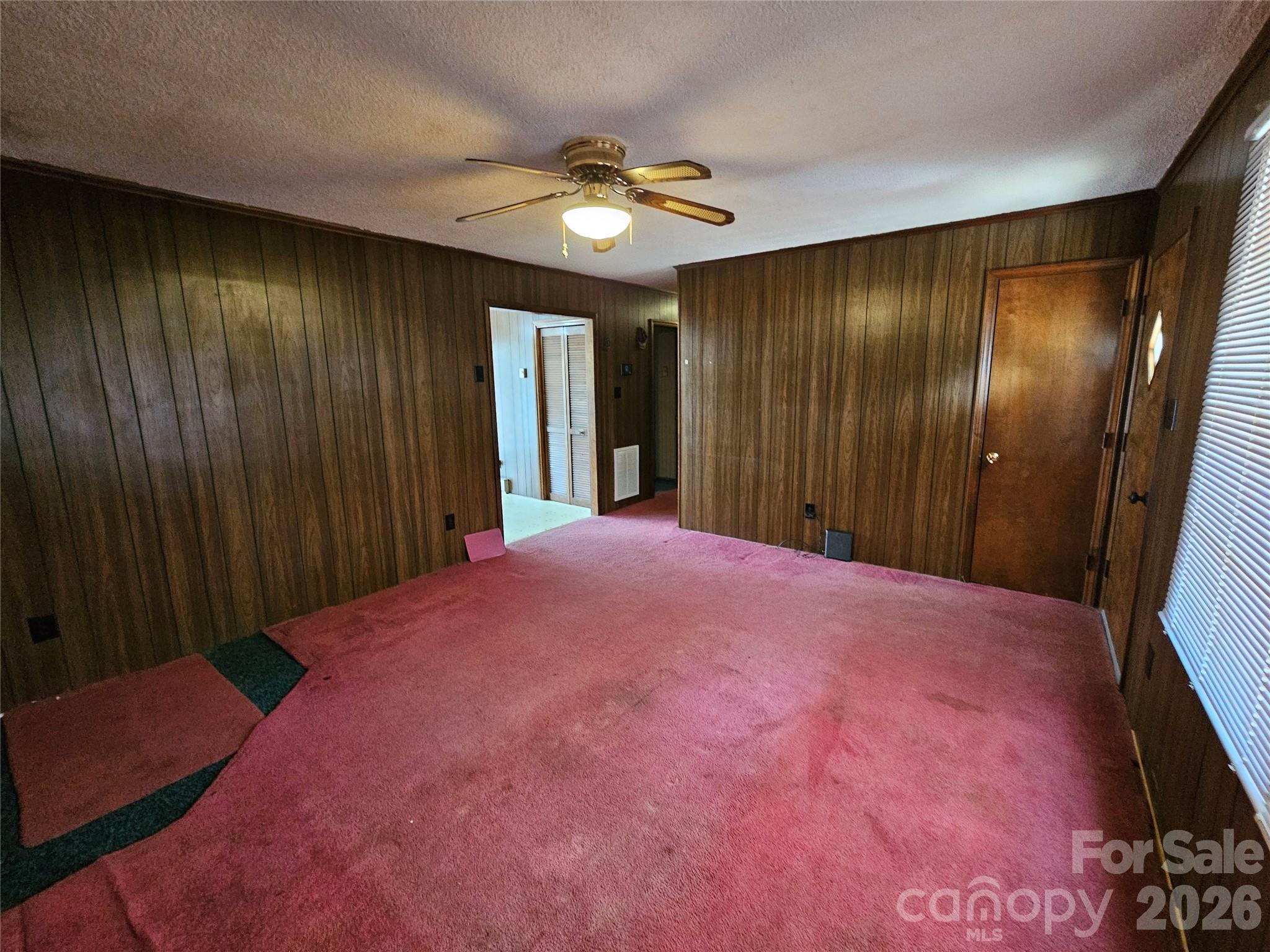7440 Tuckaseegee Road Kannapolis, NC 28081 - Photo 5 of 17 a view of livingroom with an entryway