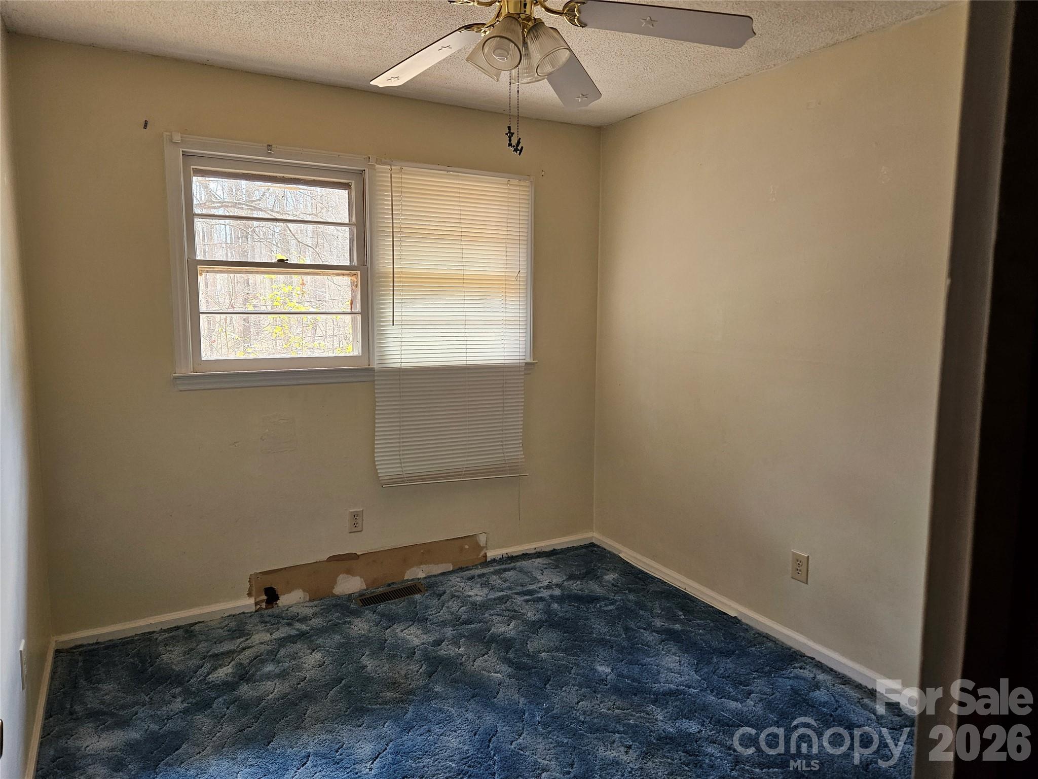 7440 Tuckaseegee Road Kannapolis, NC 28081 - Photo 10 of 17 an empty room with a window