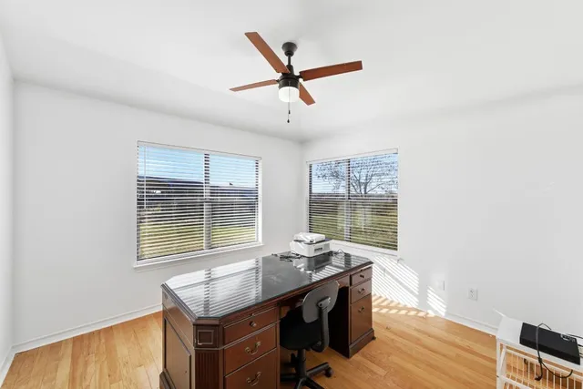 a room with table and wooden floor