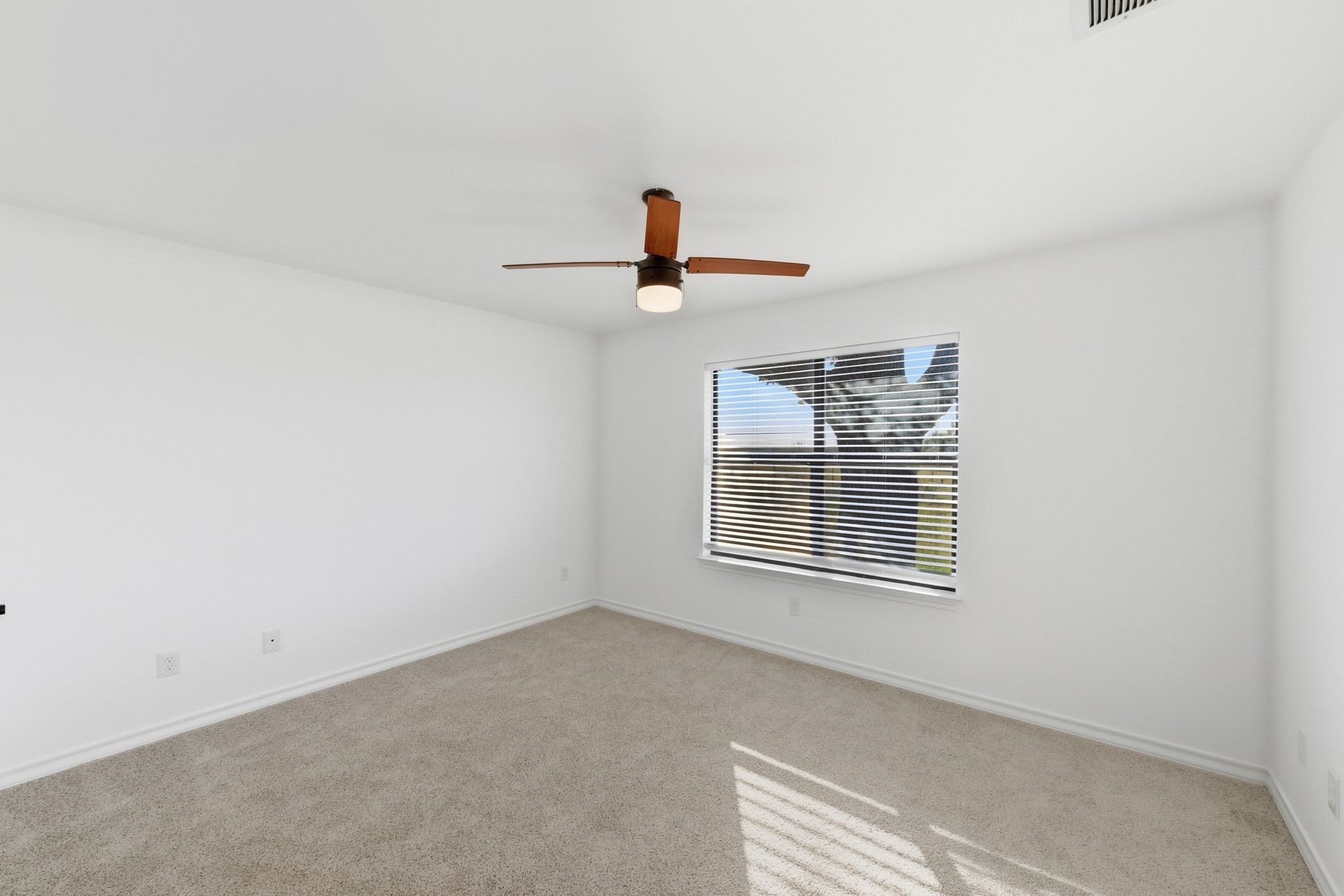 162 Farm To Market 672 Dale, TX 78616 - Photo 21 of 40 Unfurnished room featuring carpet and a ceiling fan