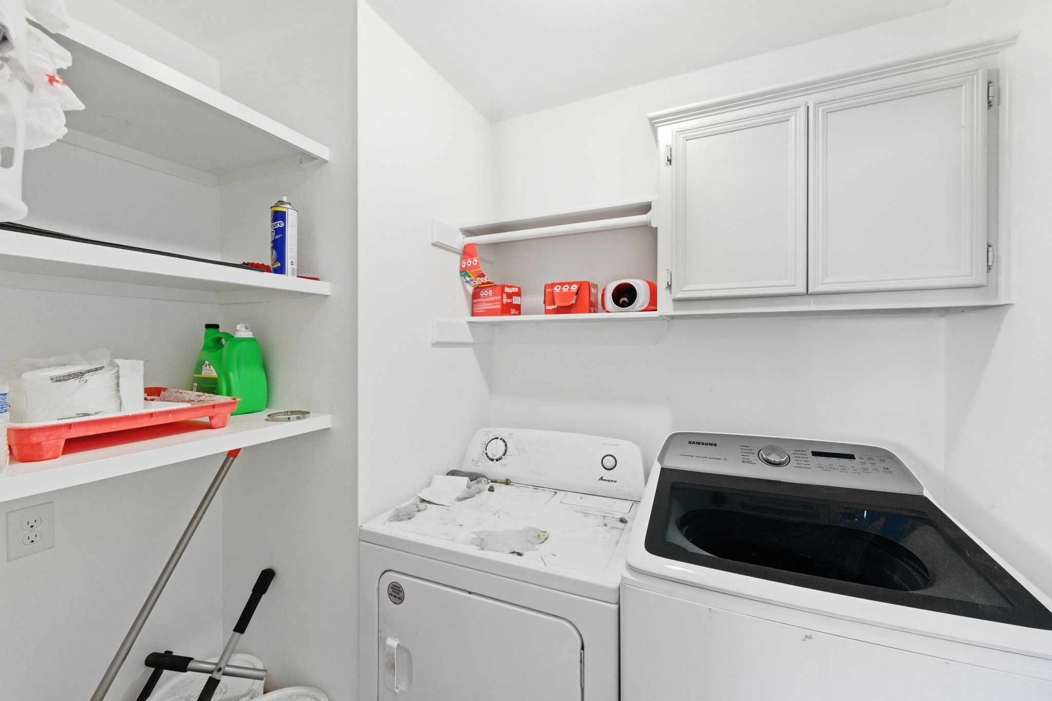 162 Farm To Market 672 Dale, TX 78616 - Photo 24 of 40 Laundry room featuring separate washer and dryer and cabinet space