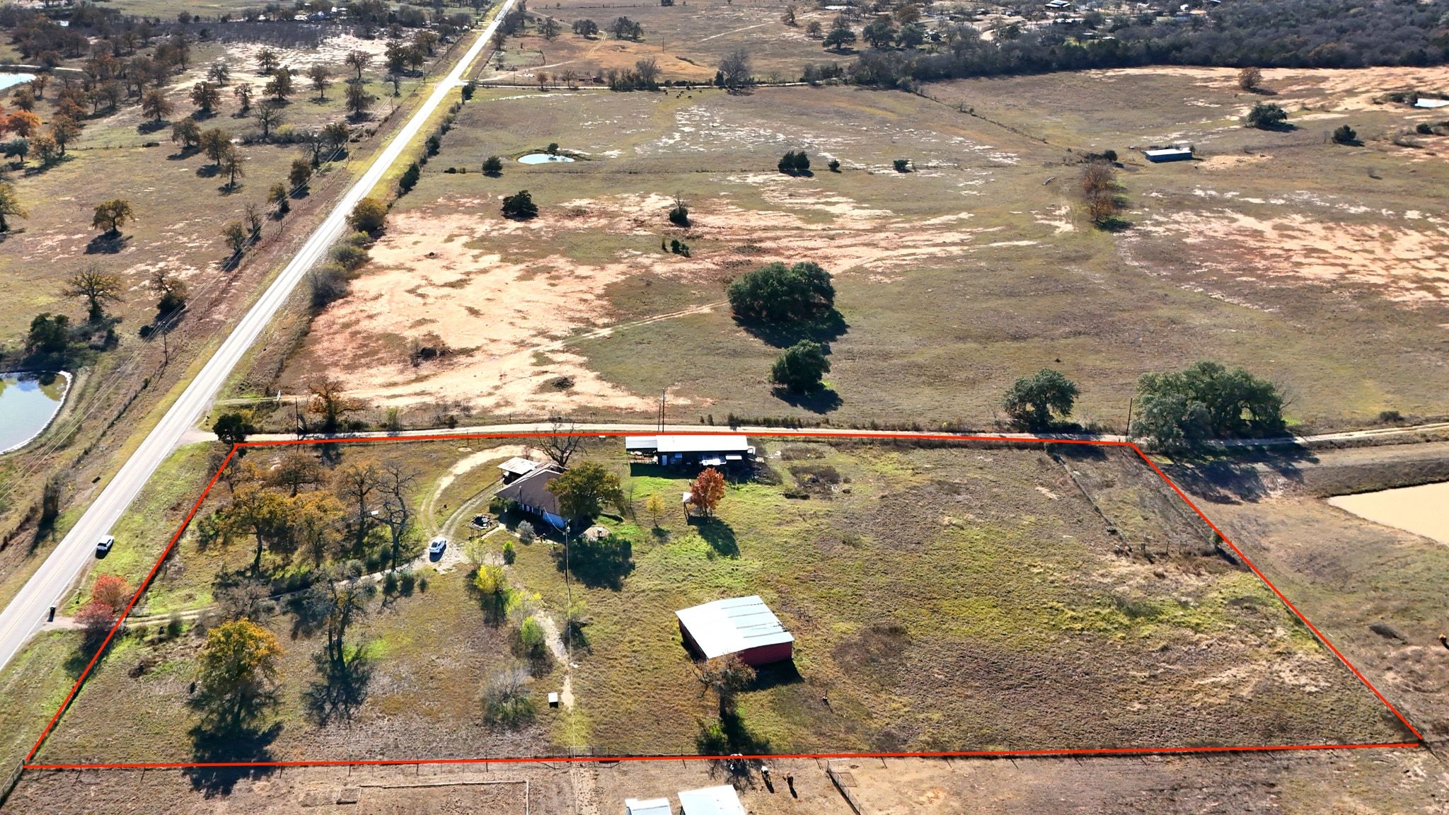 162 Farm To Market 672 Dale, TX 78616 - Photo 34 of 40 Aerial view of sparsely populated area with property parcel outlined
