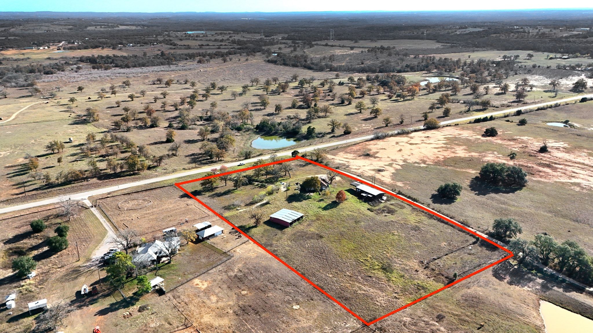 162 Farm To Market 672 Dale, TX 78616 - Photo 35 of 40 Aerial view of sparsely populated area with property boundaries highlighted